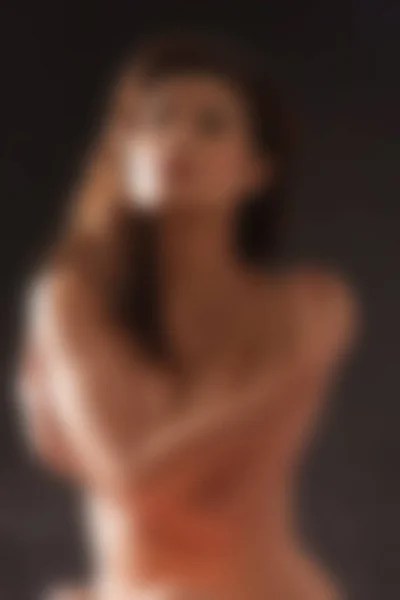 Blurry background of women nude with lighting studio on black ba — Stock Photo, Image