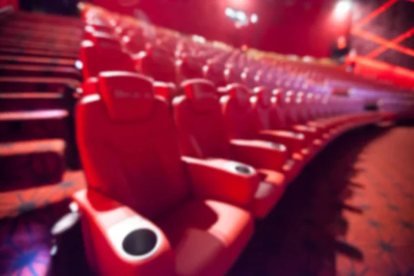 Fondo borroso de asiento rojo en el cine . —  Fotos de Stock