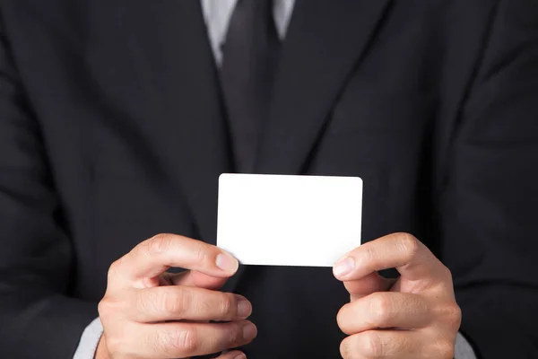 A Businessman showing his name card. — Stock Photo, Image