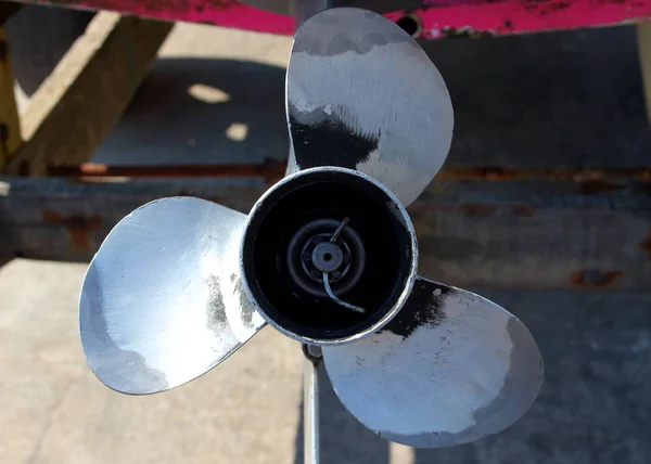 Close-up of boat propeller. Three-blade vessel propeller.