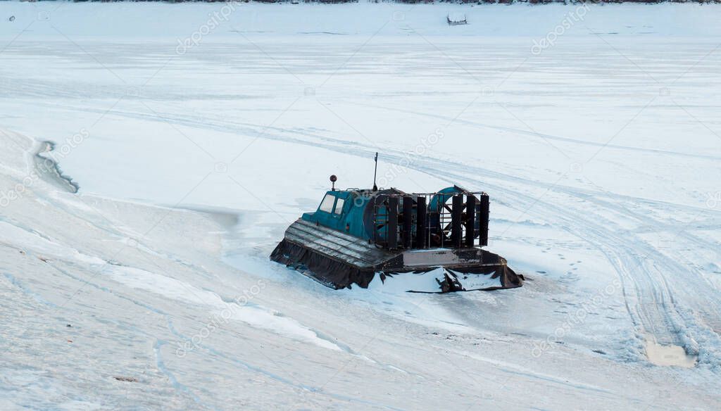 Rescue hovercraft on surface frozen Krasnoyarsk Reservoir 'Krasnoyarsk Sea' in Siberia, Russia