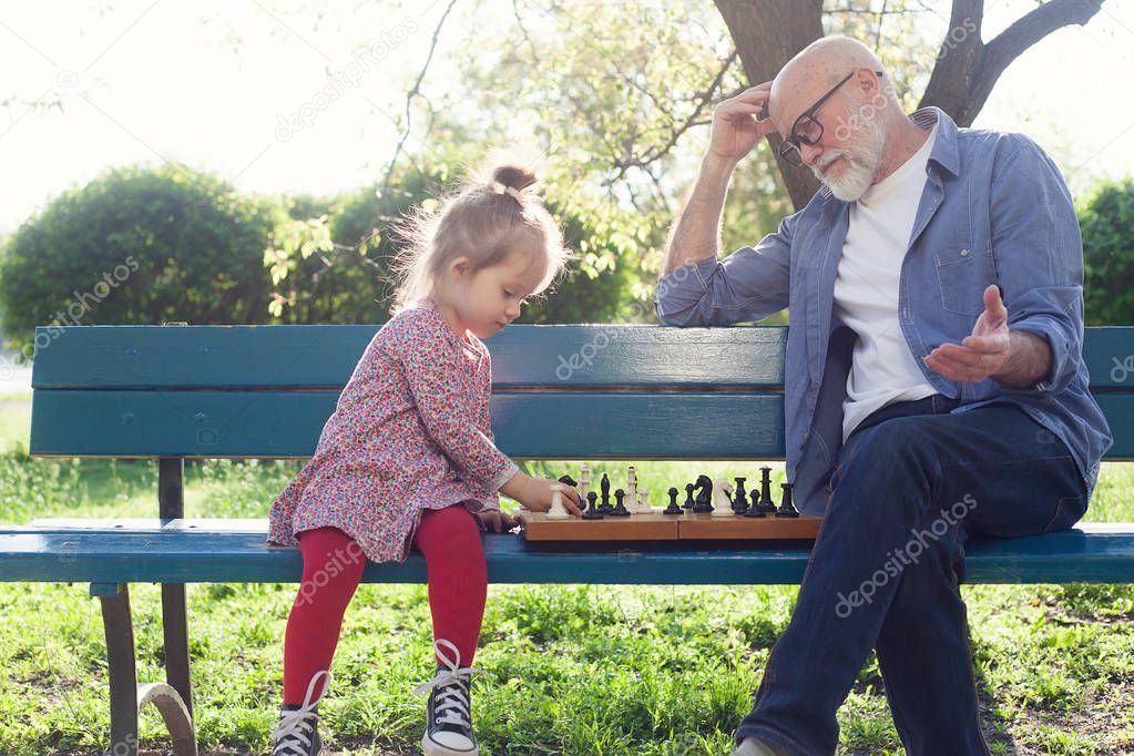 Grandfather and granddaughter spending time together