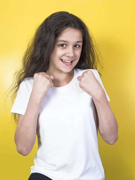 Happy smiling young woman in white shirt — Stock Photo, Image