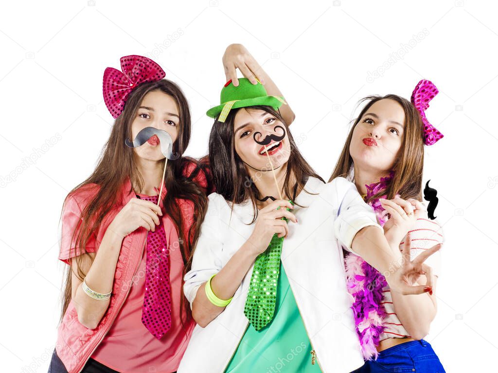 Sisters with masks on a stick. White background.