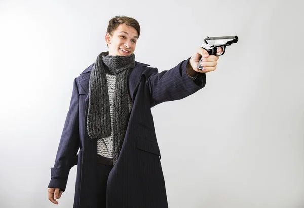 Homem Isolado Fundo Leve Com Uma Pistola Mão Como Ele — Fotografia de Stock