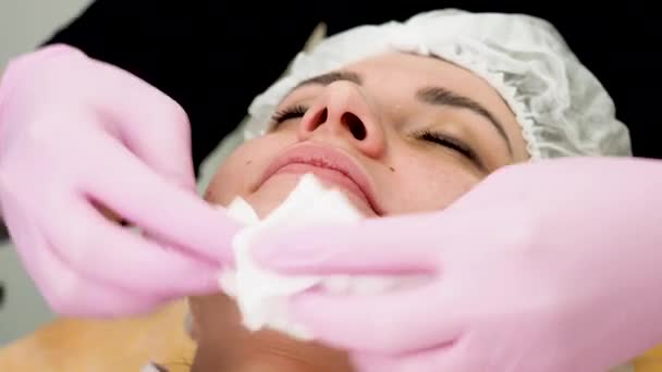 Beauty Clinic Young Woman Gets Professional Facial Procedure — Stock Video