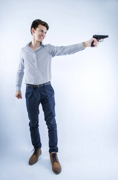 Young Handsome Man Holding Gun Grinning Undercover Law Enforcement Special — Stock Photo, Image