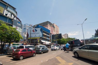 Ciudad Del Este, Paraguay - November 24, 2019: Cityscape of The Paraguayan border town of Ciudad del Este. Ciudad del Este is a commercial city, and is one of the largest free-trade zones in the world clipart