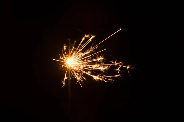 Lit Sparklers Contra Fondo Negro —  Fotos de Stock