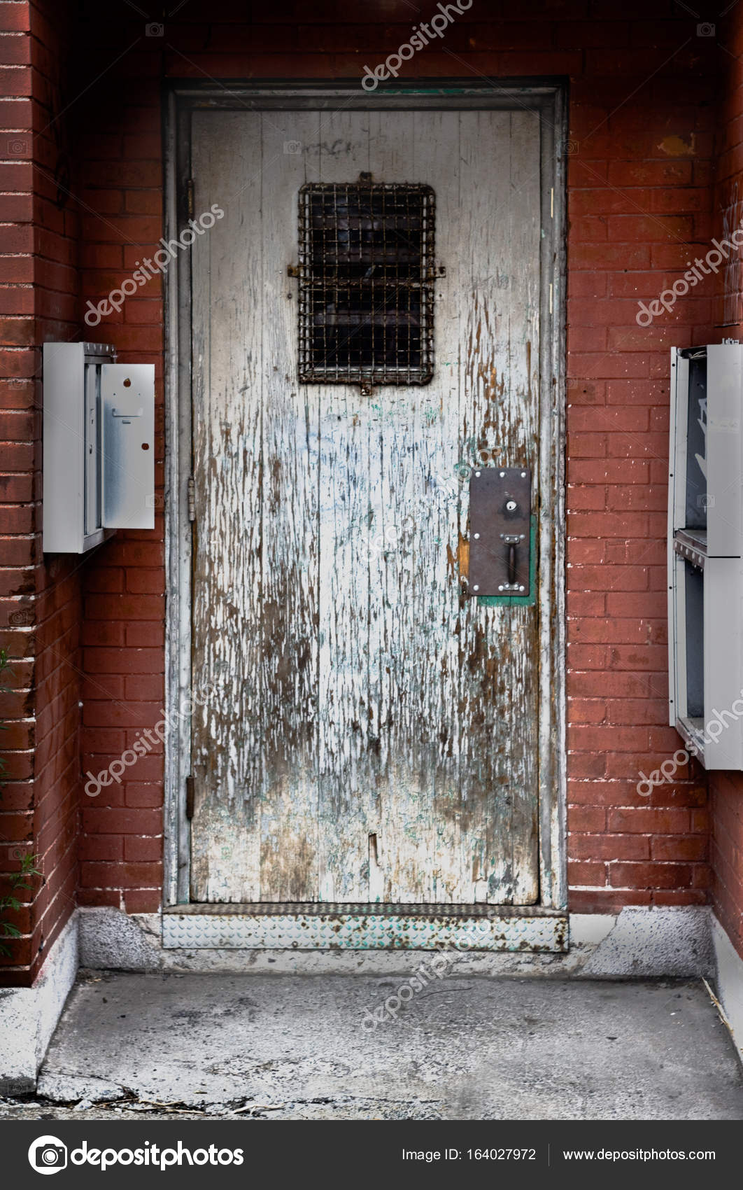 Spooky weathered wooden door Stock Photo by ©Philm04 164027972