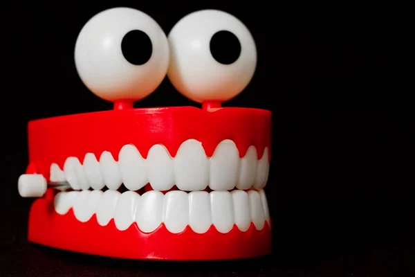 Chattering teeth toy from three quarter looking right