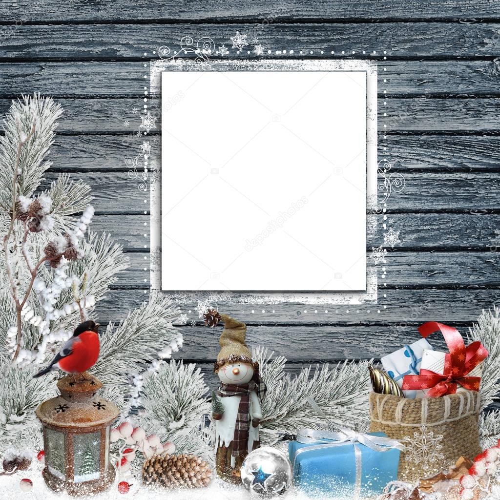 Christmas congratulatory background with frame for text or photo, snowman, gifts, pine branches and Christmas decorations
