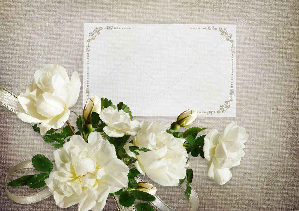 Greeting card with roses and card for text on a vintage background