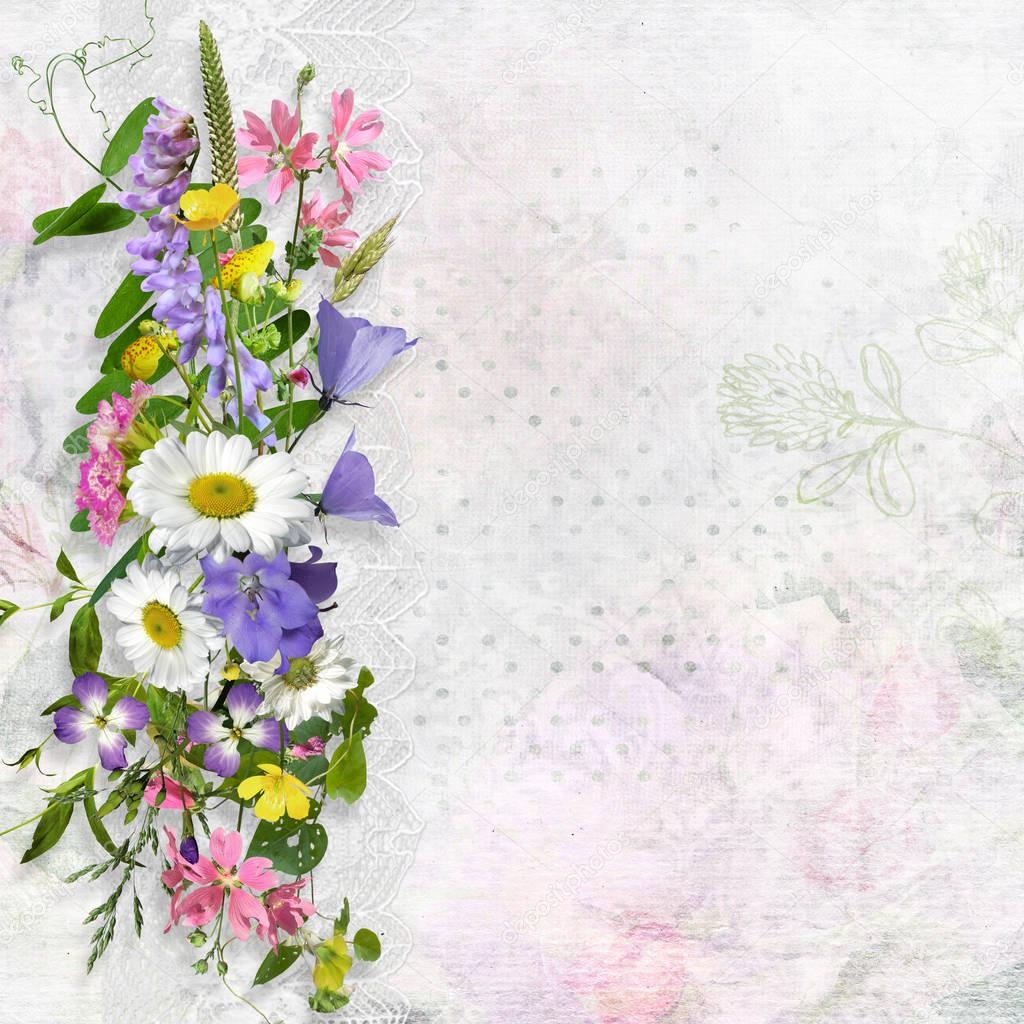 Vintage background with space for text or photo and a bouquet of summer meadow flower