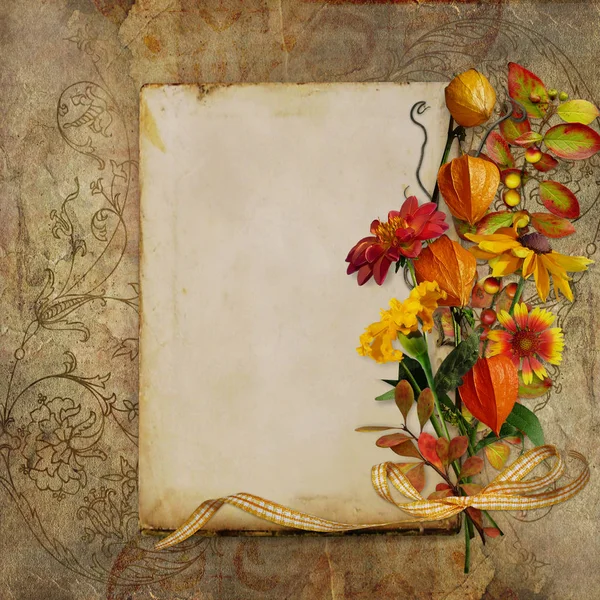 Beautiful vintage background with a bouquet of autumn flowers and a retro card with space for text or photo — Stock Photo, Image