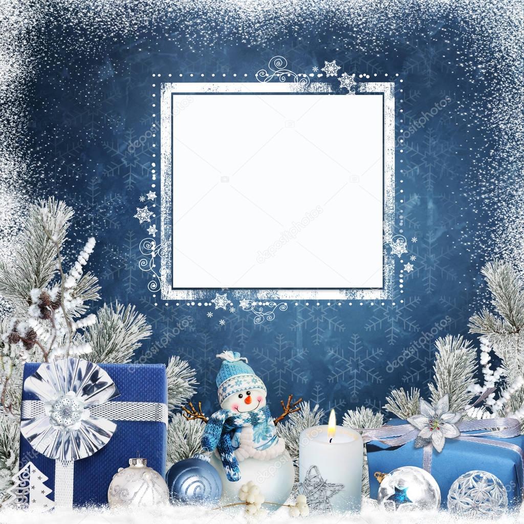 Christmas congratulatory background with card for text or photo, snowman, gifts, candles, balls and pine branches