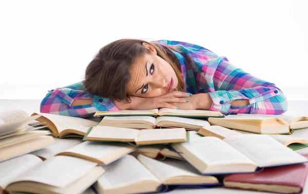 Tired student resting on books — Stock Photo, Image