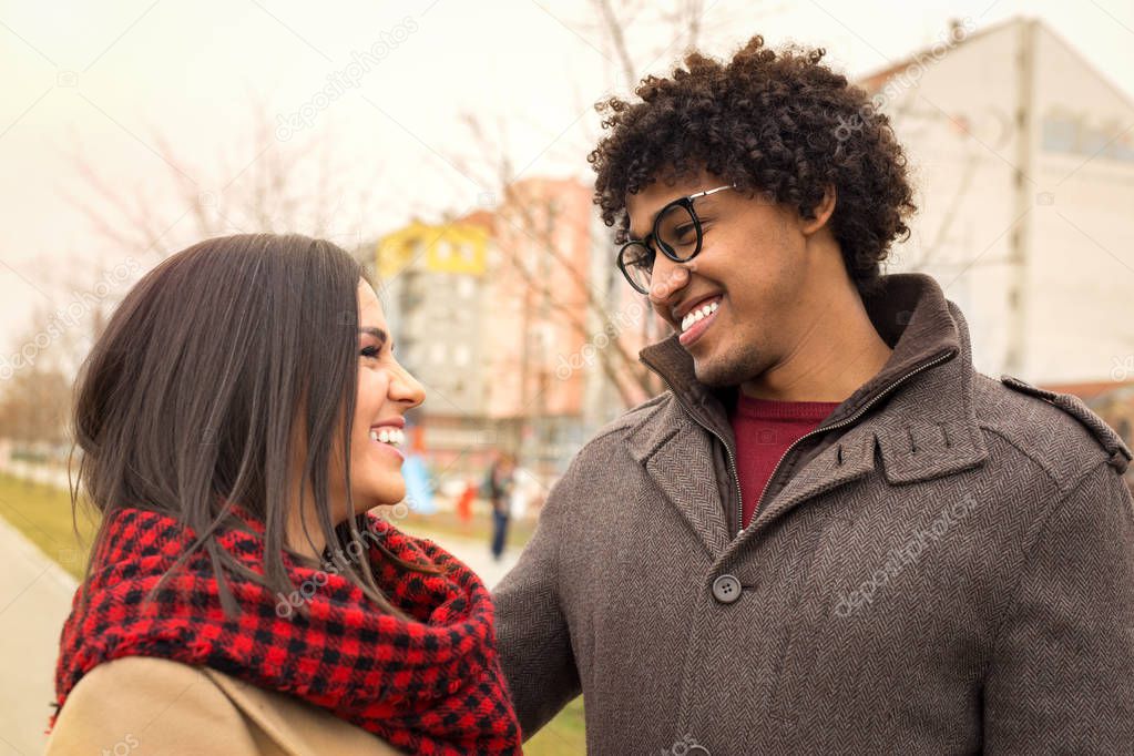 Happy couple in love looking at each other