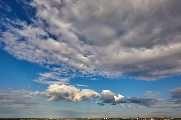 Sky clouds. Blue aerial landscape on light background. Empty background scene. Panoramic view. Sky blue background. Urban scene. Sunny day, blue sky. Wide angle. Wide panorama. Aerial view. Sky clouds