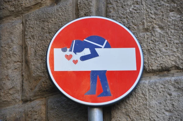 Interesting and funny street sign in Florence