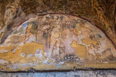 QUSAYR AMRA, JORDAN - APRIL 3, 2017: Frescoes in Qusayr Amra (sometimes Quseir Amra or Qasr Amra), one of the desert castles located in eastern Jordan clipart
