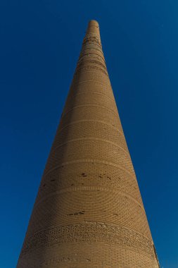 Kutlug Timur Minaret in the ancient Konye-Urgench, Turkmenistan. clipart