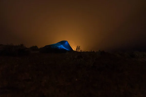 Tent near Darvaza (Derweze) gas crater (Door to Hell or Gates of Hell) in Turkmenistan