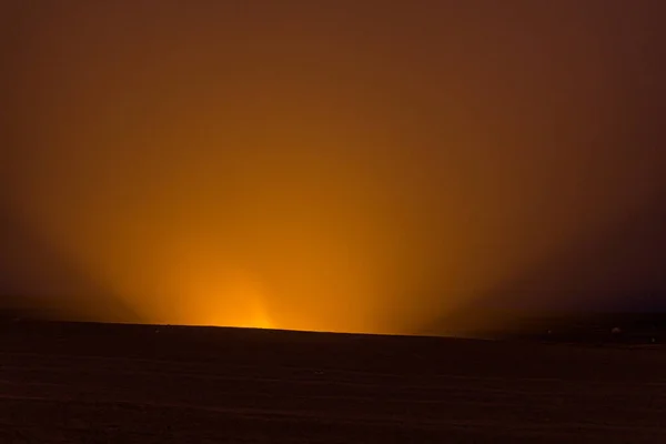 Light from Darvaza (Derweze) gas crater (Door to Hell or Gates of Hell) in Turkmenistan