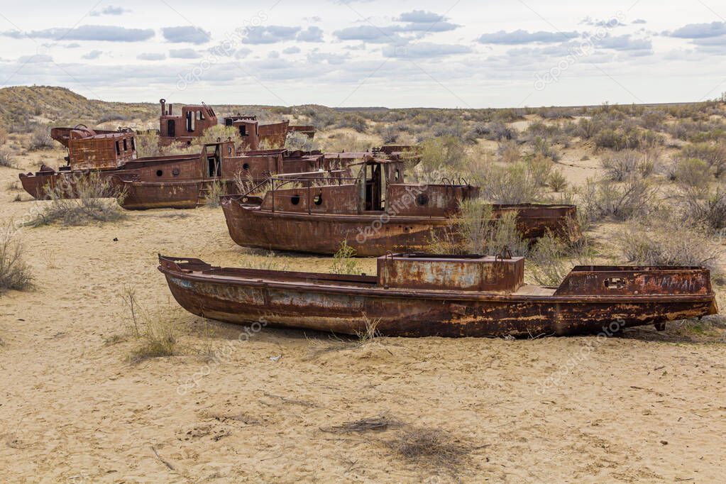 Rusty ships at the ship cemetery in former Aral sea  port town Moynaq (Moynoq or Muynak), Uzbekistan.