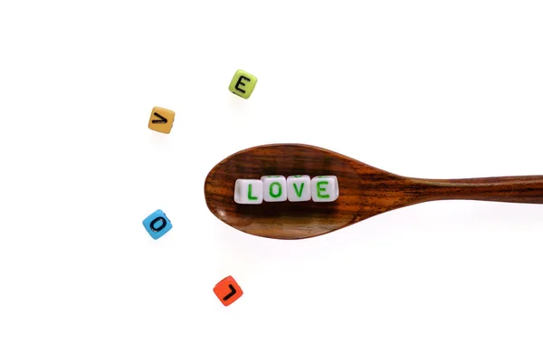 Love Word Alphabet Letter Bead Wooden Spoon Spreading Out White — Stock Photo, Image