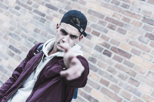 Portrait Young Man Gesturing Front Brick Wall — Stock Photo, Image