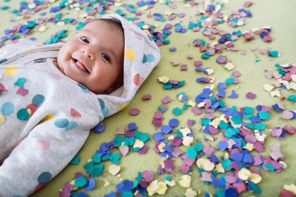 Happy Baby Girl Surrounded Colorful Confetti — Stock Photo, Image