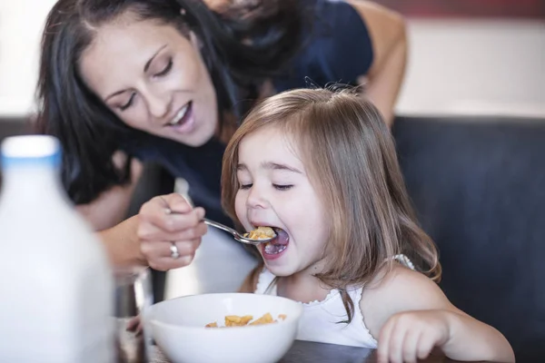 Mother Feeding Baby Breakfast Cereal Table — Stock Photo, Image