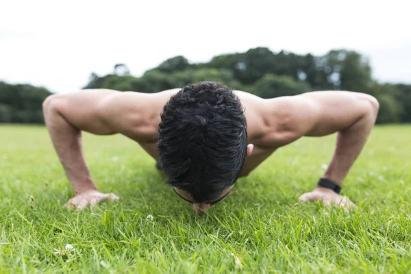 Handsome Caucasian Sporty Man Pressing Out Park — Stock Photo, Image