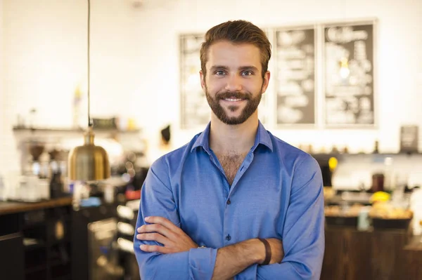 Portrait Confident Young Man Standing Cafe Arms Crossed — Stock Photo, Image