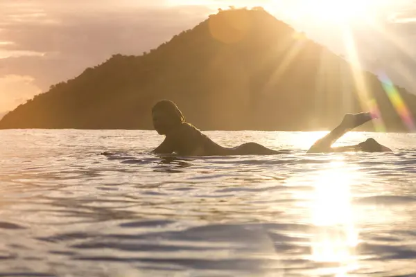 Indonesia Sumbawa Island Female Surfer Lying Surfboard Evening — Stock Photo, Image