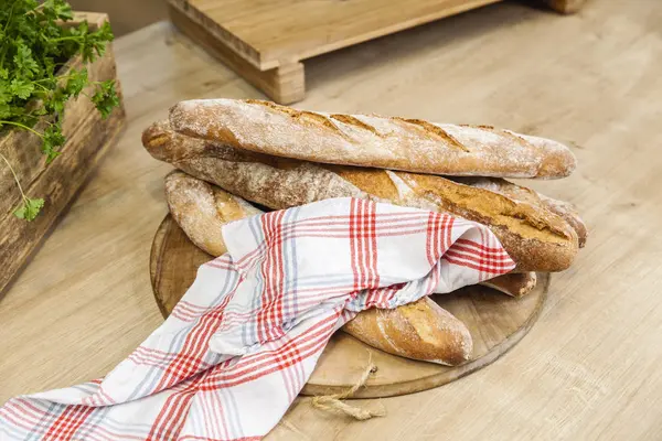 Baguettes on kitchen counter — Stock Photo, Image