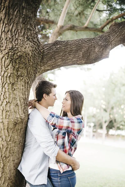 Couple in love hugging in park — Stock Photo, Image