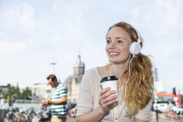 Netherlands Amsterdam Smiling Woman Headphones Coffee City — Stock Photo, Image