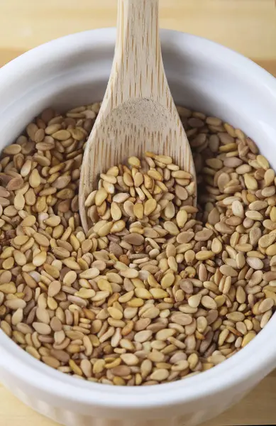 Sesame Seeds Bowl Wooden Spoon Close — Stock Photo, Image