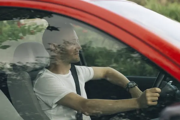 Man Driving Red Car — Stock Photo, Image