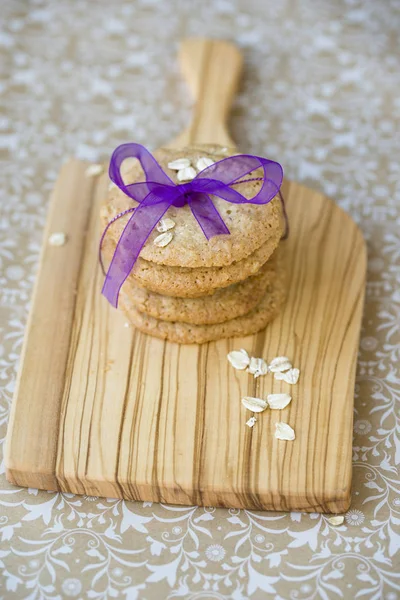Stack Oat Cookies Tied Purple Ribbon Wooden Board — Stock Photo, Image