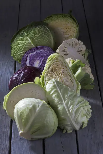 Halved Cabbage Varieties Grey Wooden Table — Stock Photo, Image