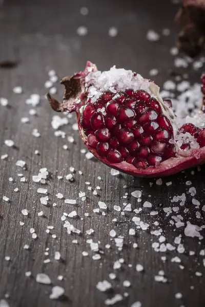 Piece Fresh Pomegranate Coarse Sea Salt Dark Wood — Stock Photo, Image