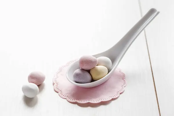 Chocolate Easter Eggs Porcelain Spoon Pink Doily — Stock Photo, Image