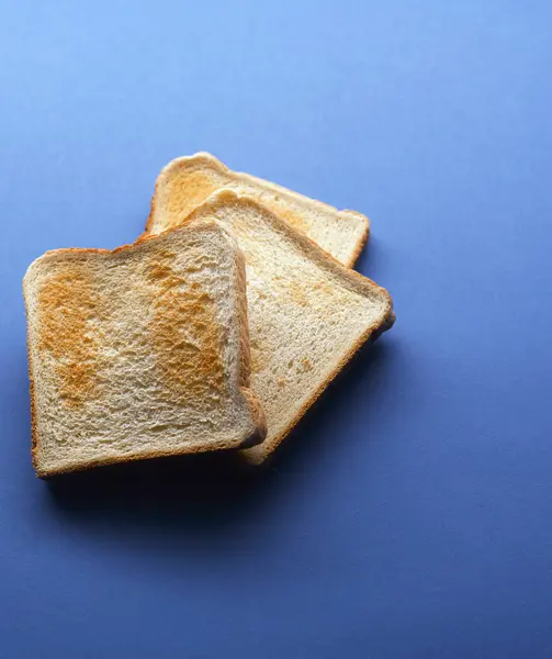 Toasted Bread Slices Blue Background — Stock Photo, Image