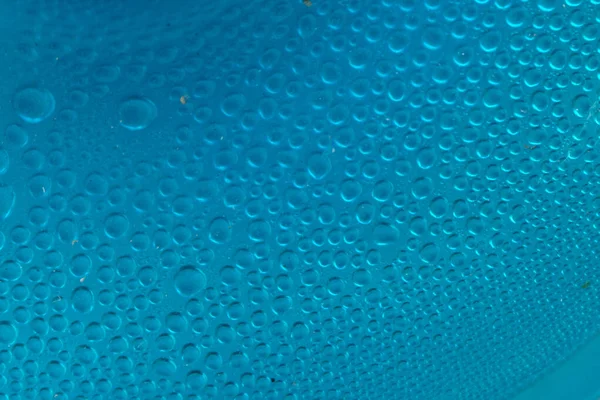 Blue water drops background close up — Stock Photo, Image