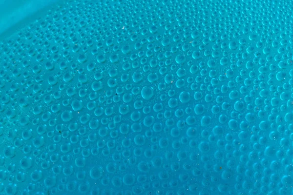 Blue water drops background close up — Stock Photo, Image