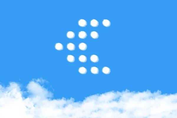 Mrak ve tvaru šipky na modré obloze — Stock fotografie