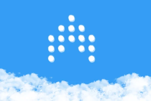 Arrow shaped cloud on blue sky — Stockfoto